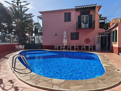 Swimmingpoolen hos eller tæt på A Casa Do Caseiro