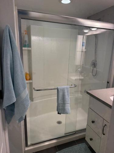 a shower with a glass door in a bathroom at Eastside Costa Mesa Residence in Costa Mesa