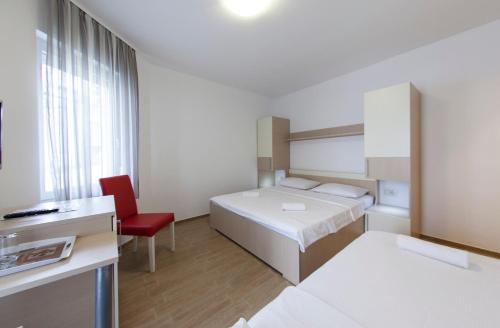 Postel nebo postele na pokoji v ubytování Guesthouse Villa Klara