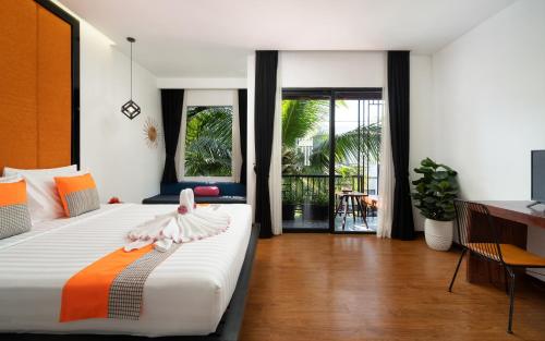 En eller flere senge i et værelse på Central Corner Suite