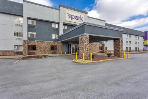 a parking lot in front of a building at Spark by Hilton Matteson Chicago I 57 in Matteson