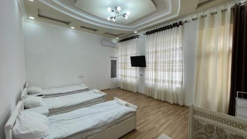 เตียงในห้องที่ Daniel SAMARKAND