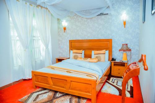 Llit o llits en una habitació de Beaco Resort