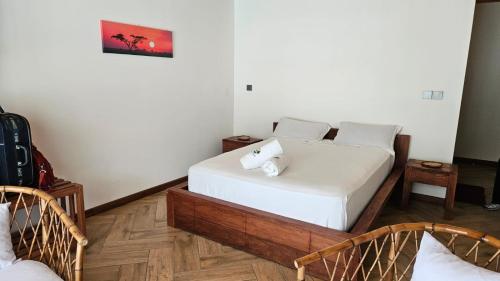 Llit o llits en una habitació de Le Roc Resort