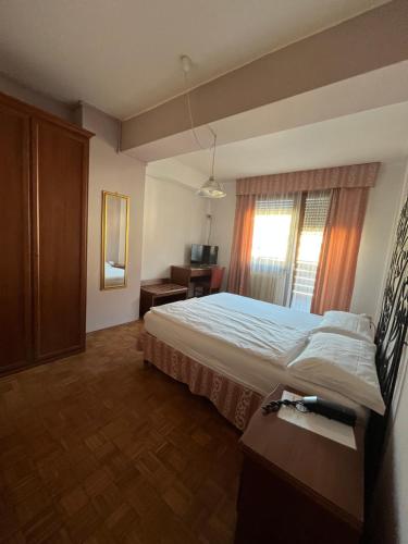 Postel nebo postele na pokoji v ubytování Locanda Seggiovia
