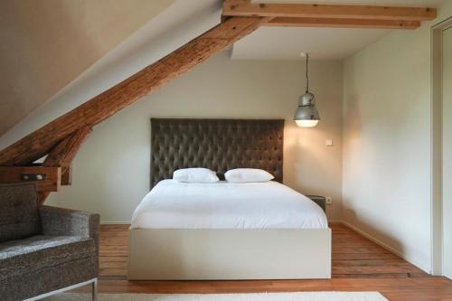 Krevet ili kreveti u jedinici u objektu GRAACE House Suites