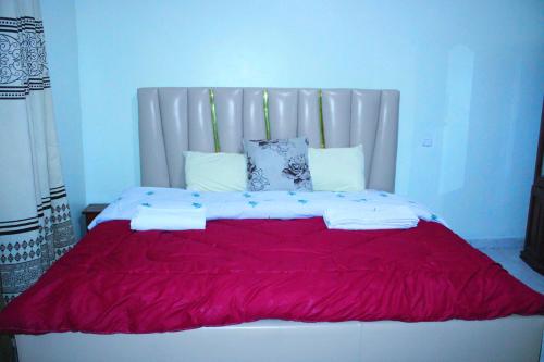 Llit o llits en una habitació de Heritage House Rwanda