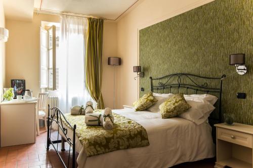 Postel nebo postele na pokoji v ubytování B&B Residenza Di Via Fontana