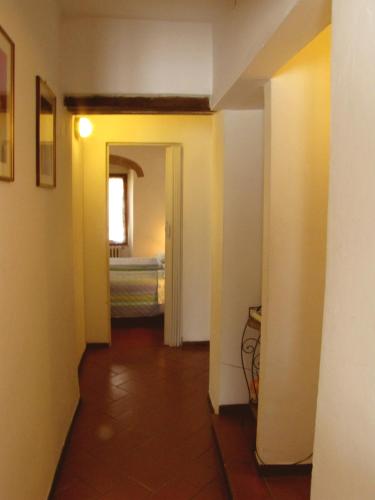 Una cama o camas en una habitación de Residence Casprini da Omero