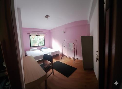 Llit o llits en una habitació de Happy Homes