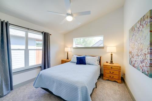 a bedroom with a bed and a window at Bozeman Home with Deck Walk to Fishing, Hot Springs in Bozeman