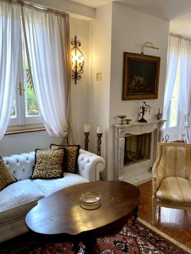 a living room with a couch and a coffee table at Rooftop Garden in Bologna