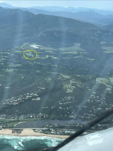 a yellow circle on the ground near a beach at Protea cottage in Wildernis