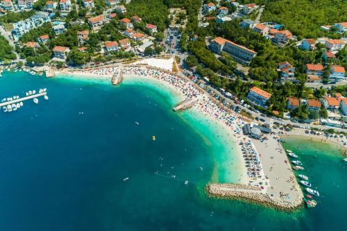 an aerial view of a beach in a resort at House Scaena in Jadranovo