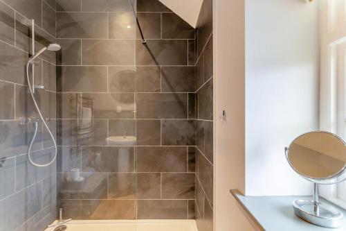 a bathroom with a shower with a glass door at 2 Bed in Selside oc-ds1067 in Selside