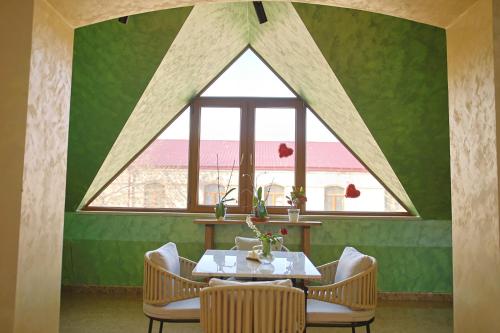 Un lugar para sentarse en Passage Hotel Goris