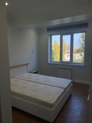 Llit o llits en una habitació de AmirTower
