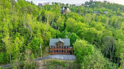 an aerial view of a house in the middle of a forest at HotTub Sauna Pool Table Views Mins to Downtown Gatlingburg Hollows Haven in Gatlinburg