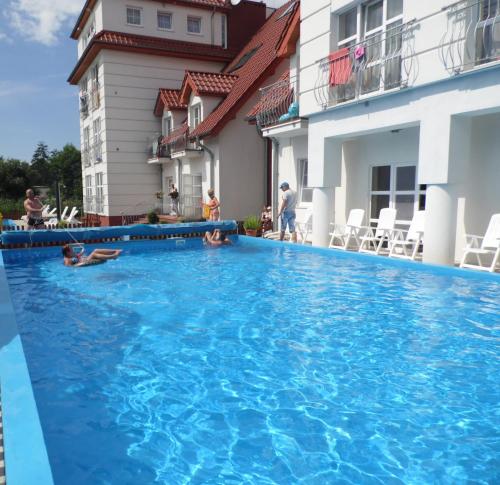 Bazén v ubytování Ośrodek Wypoczynkowy Słońce Dąbki nebo v jeho okolí