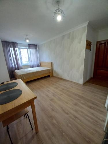 เตียงในห้องที่ Sadoveanu Rooms