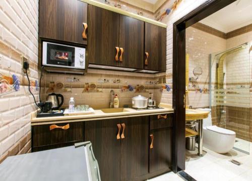 Bilik mandi di Lambert ApartHotel