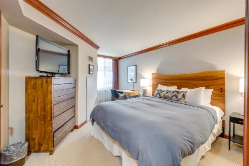 a bedroom with a large bed and a flat screen tv at Everline Suite w/ Resort Perks! 7 Mi to Lake Tahoe in Olympic Valley