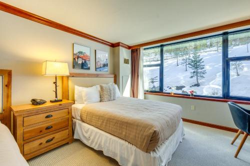 a bedroom with a bed and a window at Olympic Valley Summer Sanctuary in Everline Resort in Olympic Valley
