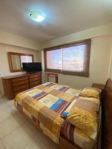 Llit o llits en una habitació de los sauces