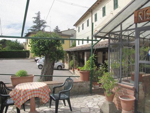 Un restaurante u otro lugar para comer en Residence Casprini da Omero