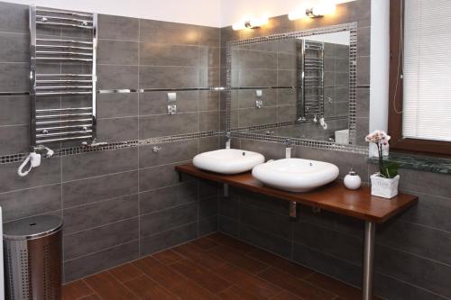 Ванна кімната в Jedynka Apartments