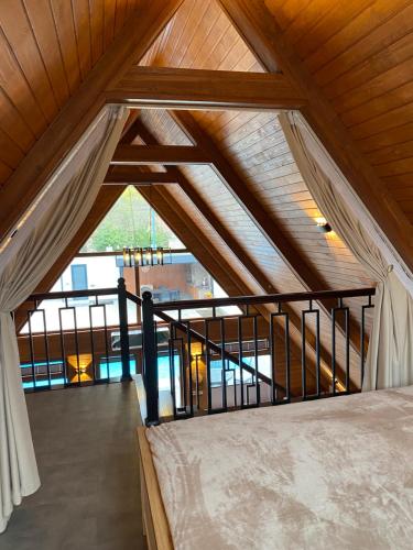 Llit o llits en una habitació de A-Frame Elite Uyut