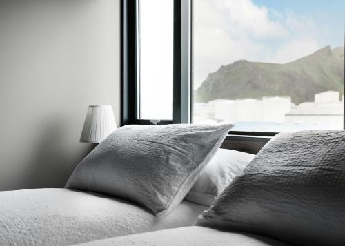 Llit o llits en una habitació de Pier Apartments