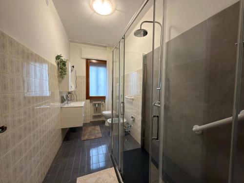 a bathroom with a shower and a sink and a toilet at CA'venezia in Mestre