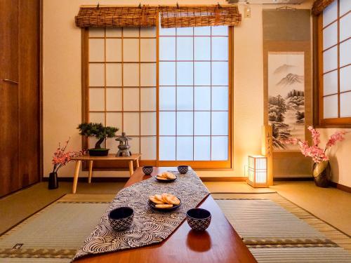 a living room with a table with oranges on it at New! Ten people Shin Ookubo 6minPocket WIFI in Tokyo