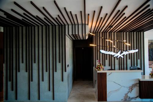 a room with a hallway with black and white stripes at Lavendish Hills Kandy in Kandy