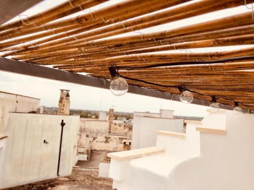 a view of a building with lights on the ceiling at B&B Palazzo Boccaccio in Matino