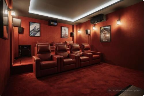a waiting room with a bunch of chairs in it at Palm Villa - Award Winning Modern Luxury & Exclusive Villa in Chiang Mai