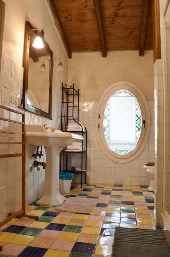 a bathroom with a sink and a mirror at Belvedere in Zola Predosa