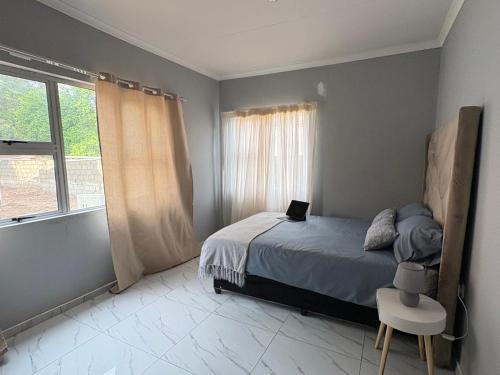 Llit o llits en una habitació de Elephant Cove