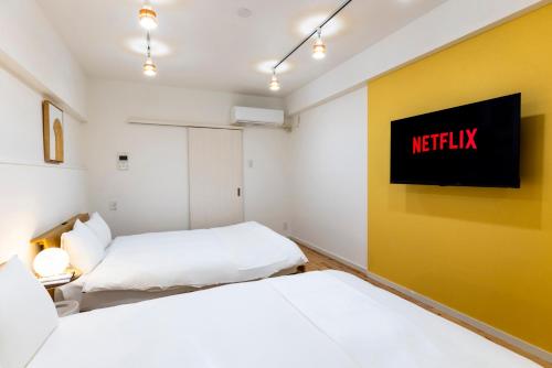 urban stay 唐人 地下鉄駅まで10秒 中長期宿泊向け 最大4名 Wifi ドラム式洗濯機 調理道具 etc
