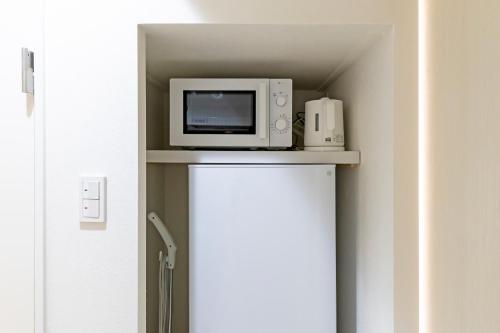 urban stay 唐人 地下鉄駅まで10秒 中長期宿泊向け 最大4名 Wifi ドラム式洗濯機 調理道具 etc