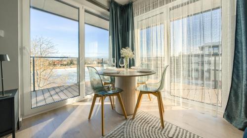 Sagaris z basenem, Sun & Snow