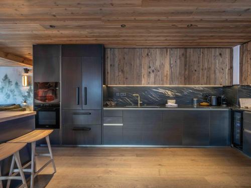 Appartement Chalet de Luxe au Pied des Pistes à Méribel avec Parking