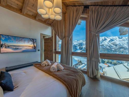 Appartement Chalet de Luxe au Pied des Pistes à Méribel avec Parking