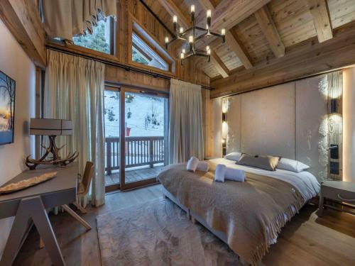 Appartement Chalet de Luxe au Pied des Pistes à Méribel avec Parking