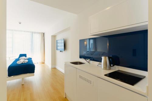 a kitchen with a sink and a counter top at Hotel sea view in Batumi