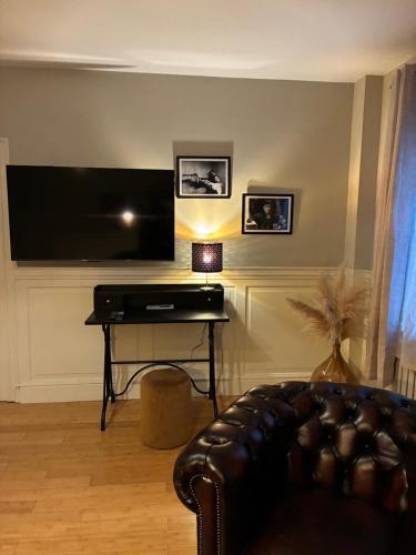 TV tai viihdekeskus majoituspaikassa Hotel Saint Georges