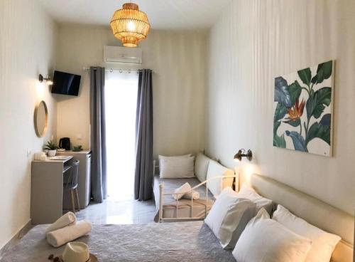 a living room with a couch and a table at stelisia2 in Chania