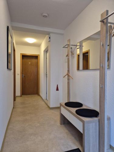 a hallway with two toilets in a room at Ferienwohnung Annenblick in Sankt Wendel