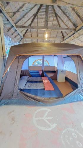 a tent with a bed in the middle of it at Coco Tent Seaview 360 in Ko Lanta